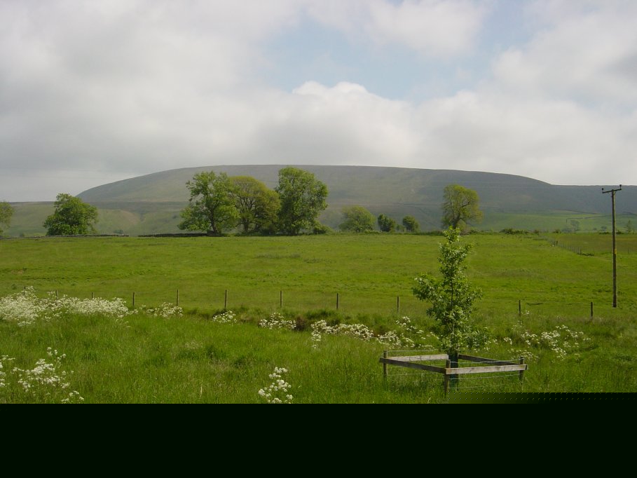 Looking back at Pendle hill en route to the pub